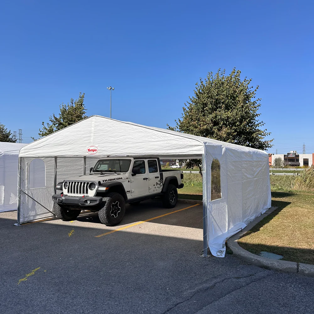 Side view of double tempo shelter with one car underneath